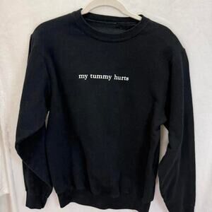 Black crewneck sweatshirt with minimalist